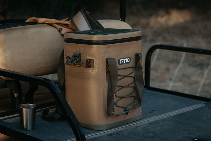 RTIC backpack cooler in the shade on cart