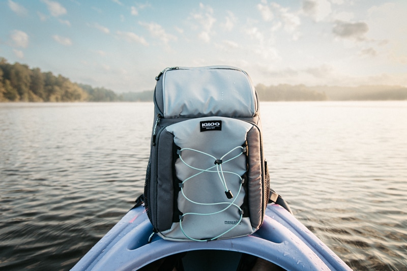 Igloo backpack cooler on kayak in lake
